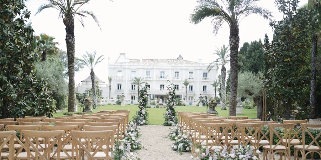 Grand chateau wedding - Chateau Hermitage de Combas. Wedding aisle, chairs, and a beautiful white chateau.